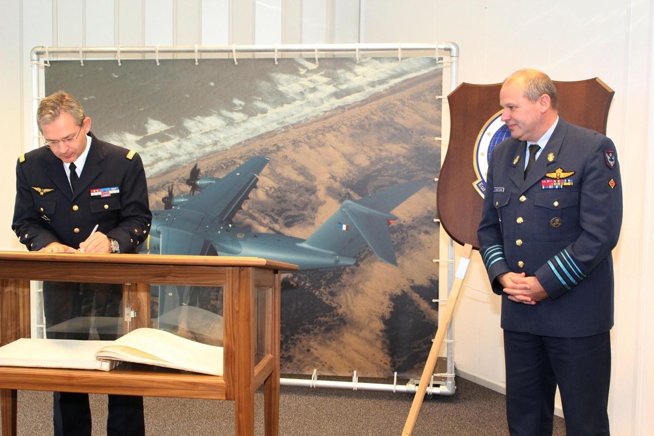 General Van de Voorde watches General Mercier signing the FOC certificate